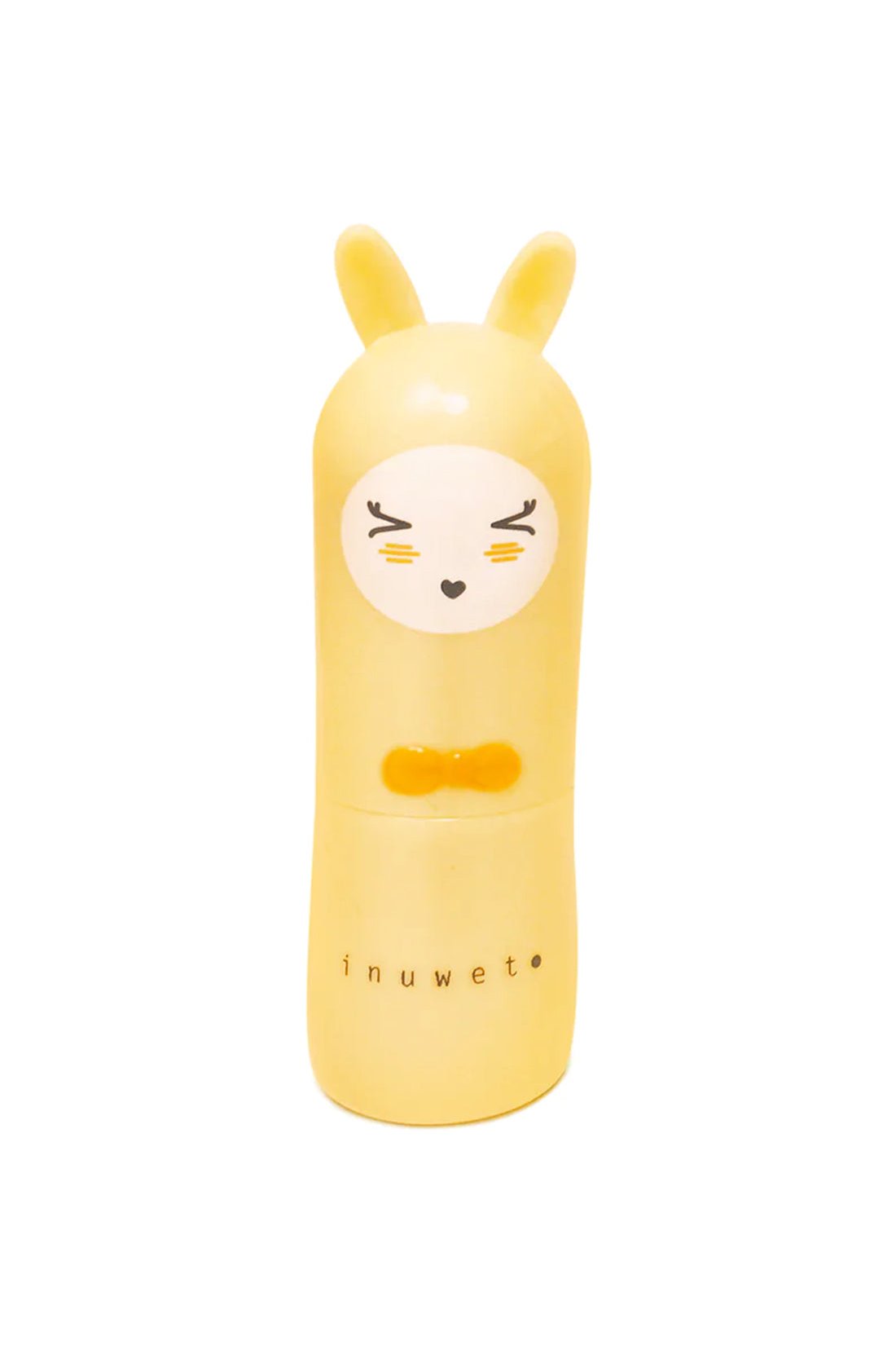 The Bunny Lip Balm Pineapple by INUWET is a cute cylindrical lip balm tube that resembles a charming golden yellow cartoon character with bunny ears. The front of the tube features an adorable face with sleeping eyes, blushing cheeks, and a small smile, with the brand name "INUWET" printed near the bottom. This vegan and cruelty-free product is perfect for all ages.