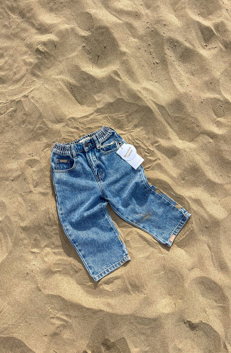 Jagger jean flat laid in the sand