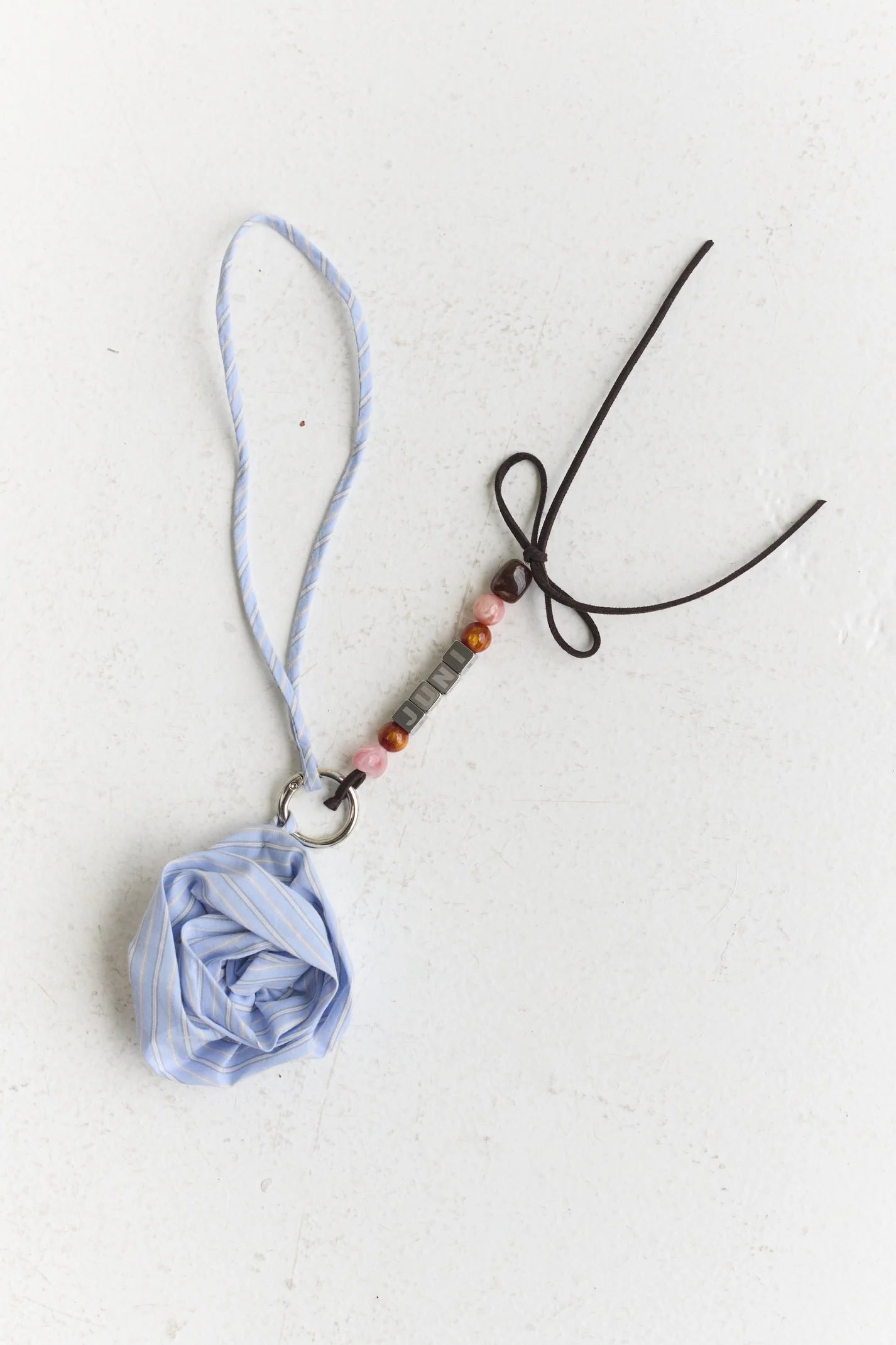 JUNI - Rose Bag Charm Blue Stripe