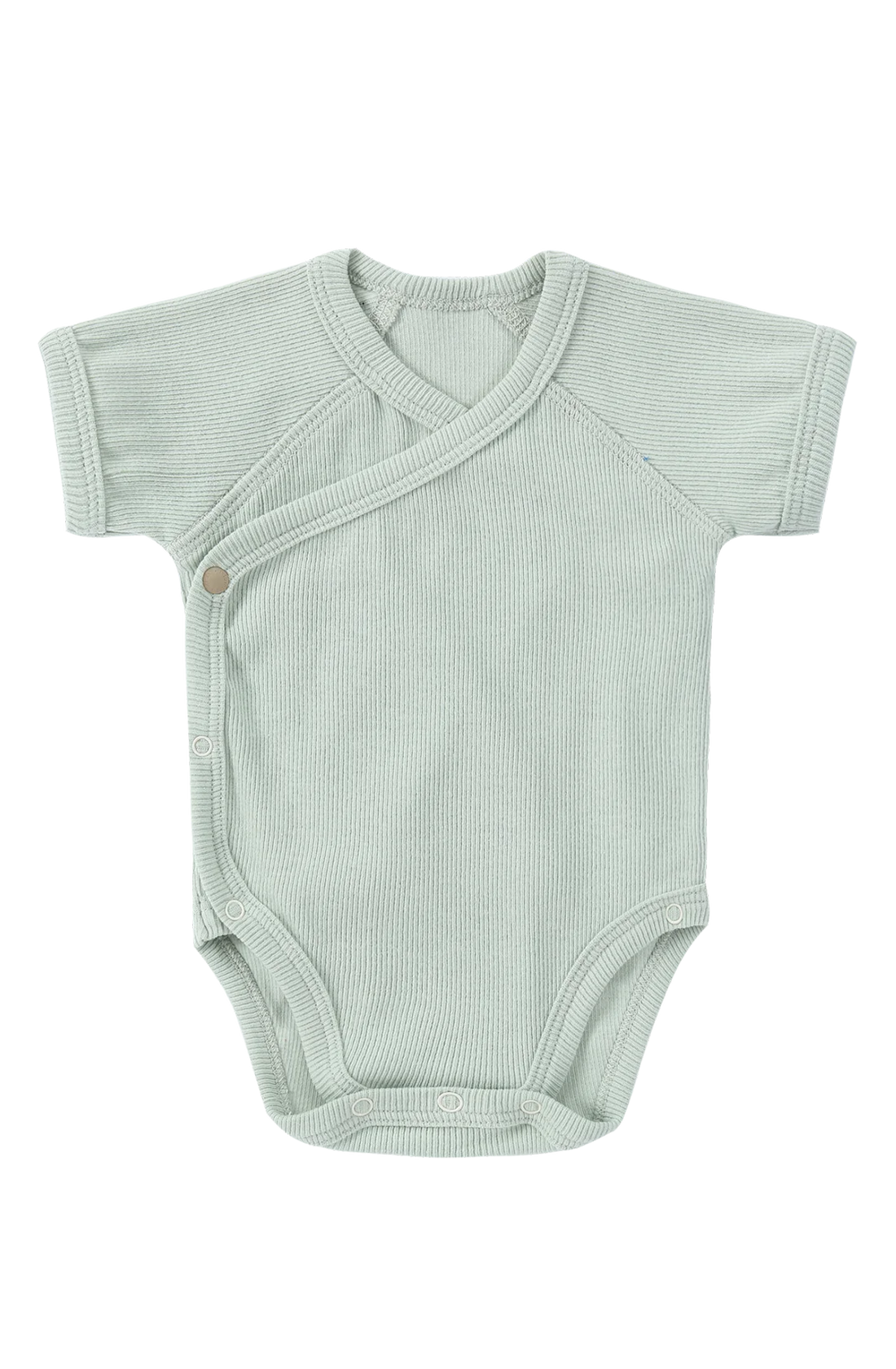 The Kimono Bodysuit SS Sea Mist from SUSUKOSHI is a light green, short-sleeved baby onesie ideal for everyday wear. It features a convenient wrap-around design with snap buttons along the side and crotch area. Made from soft, ribbed organic cotton elastane, it offers maximum comfort for your little one.