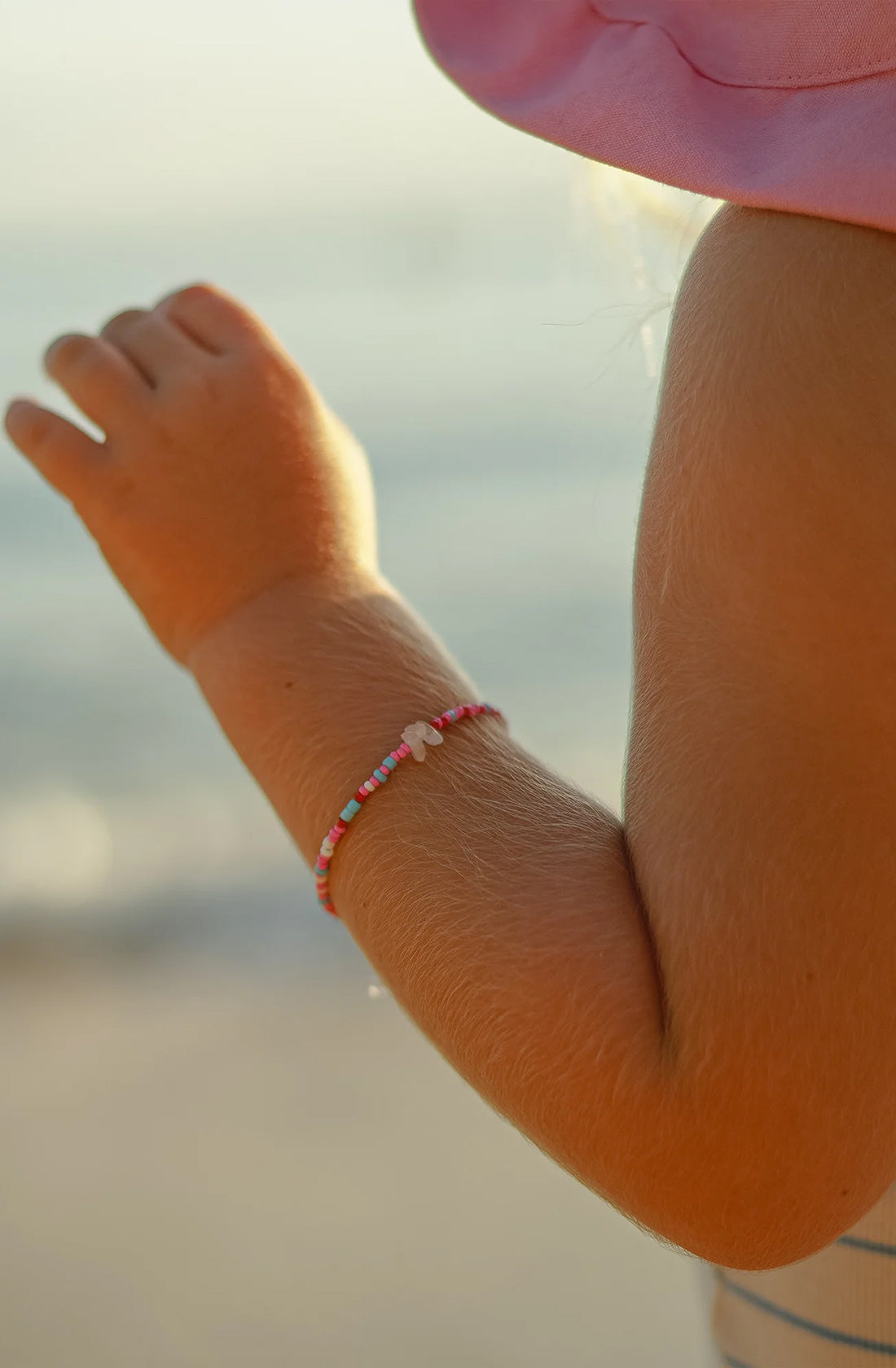 KRYSTLE KNIGHT JEWELLERY  Dusk Bracelet on a childs wrist.