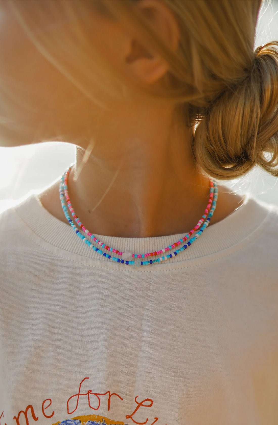 KRYSTLE KNIGHT JEWELLERY Seaside Necklace worn by a young girl.