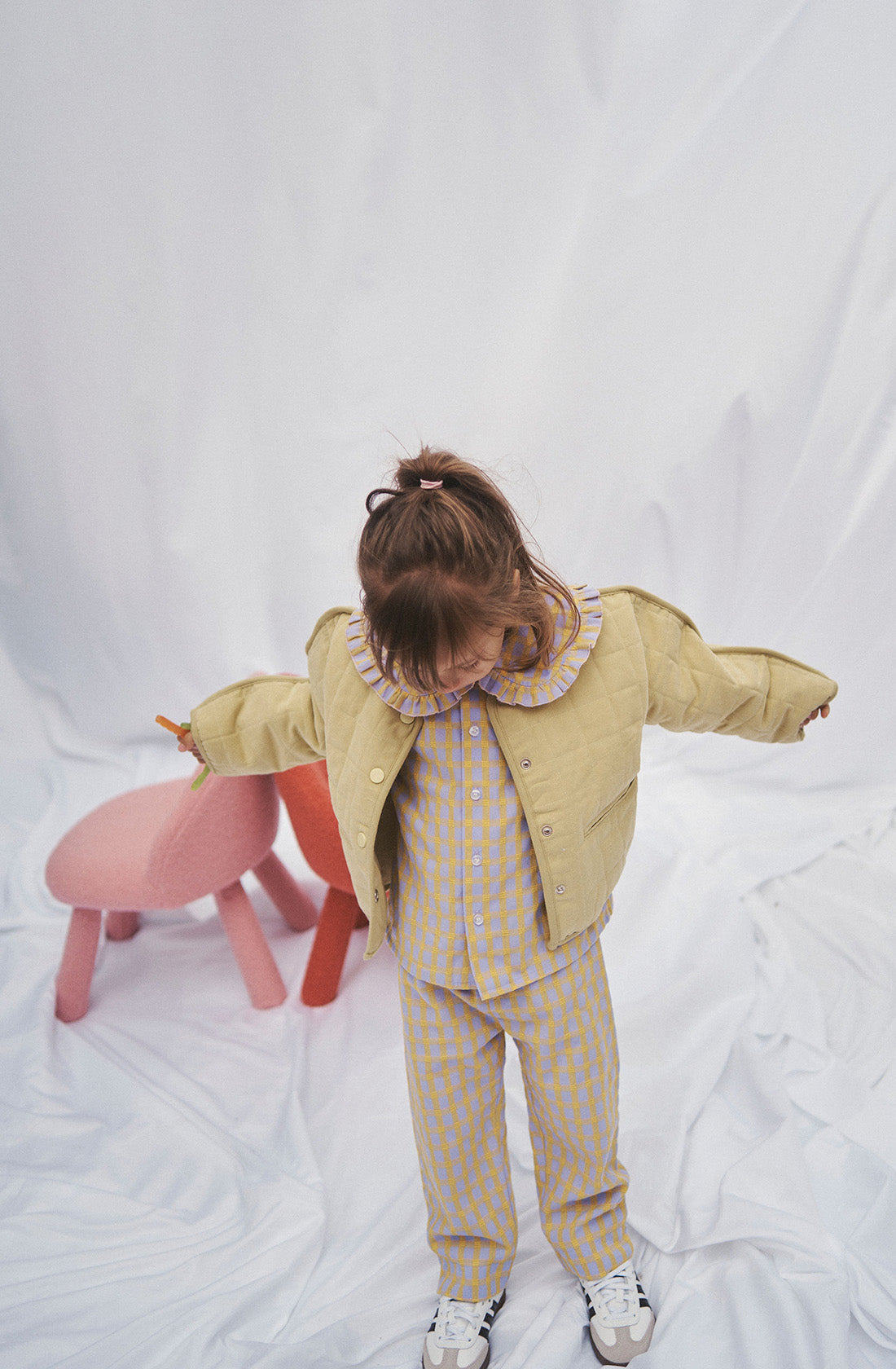 Young kid wearing the parker quilted jacket.