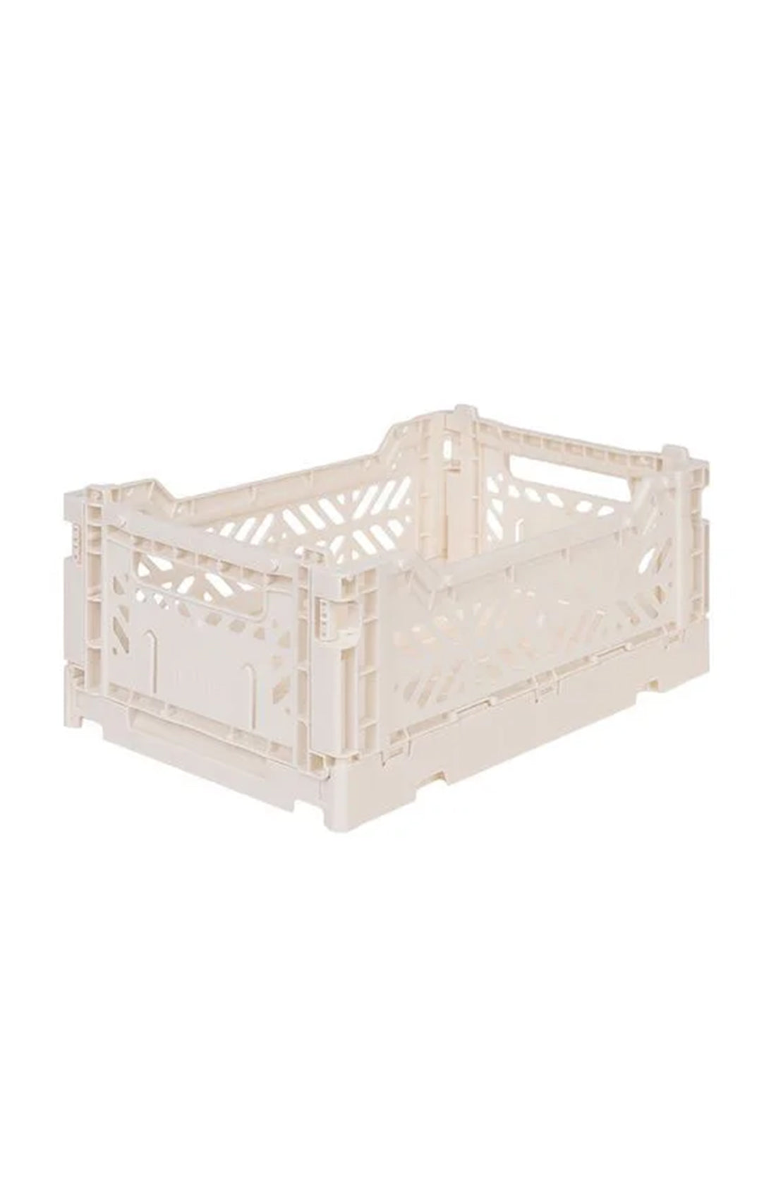 The Mini Storage Crate Coconut by AYKASA is a beige, rectangular plastic crate featuring intricate, lattice-like cutout patterns on the sides and reinforced corners, showcasing its durable construction. This versatile folding crate is perfect for home organizing or transport purposes.