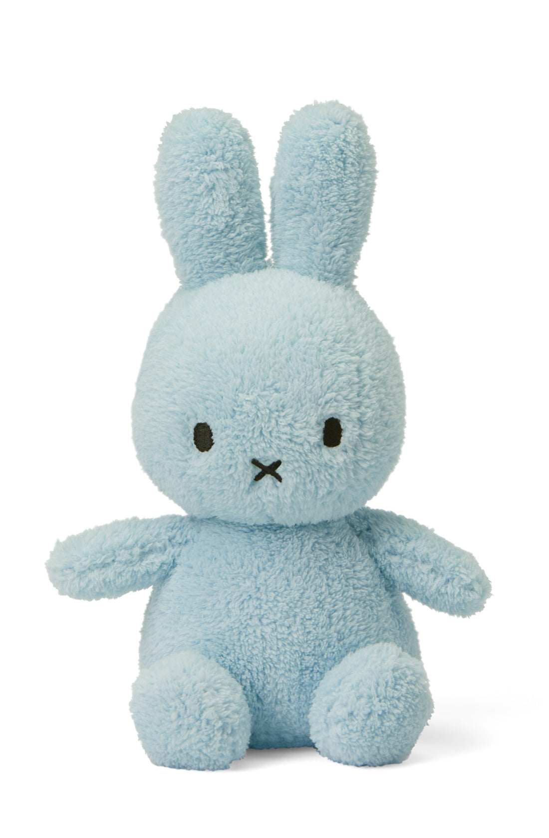 Introducing the Miffy Sitting Terry Light Blue 23 cm, a delightful plush toy from BON TON TOYS X MIFFY. This endearing blue bunny rabbit features long ears and short limbs, with simple black eyes and an iconic small black "x"-shaped mouth. Part of the charming Miffy Terry Collection, its soft and fluffy texture makes it perfect for cuddling and an ideal baby gift. The background is plain white, highlighting its appealing design.