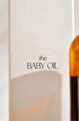 Close up of the words 'the baby oil' on product packaging