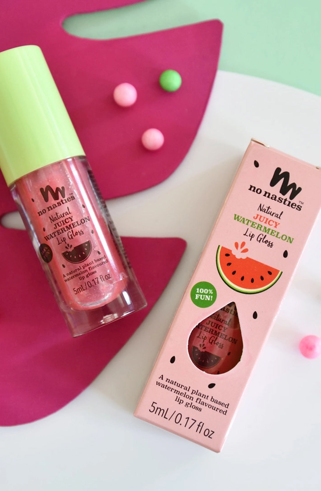 The no nasties natural juicy watermelon lip gloss in its packaging and outside its packaging.