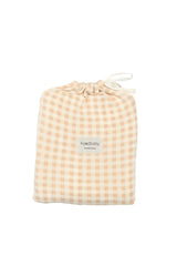 Neutral gingham swaddle in packaging