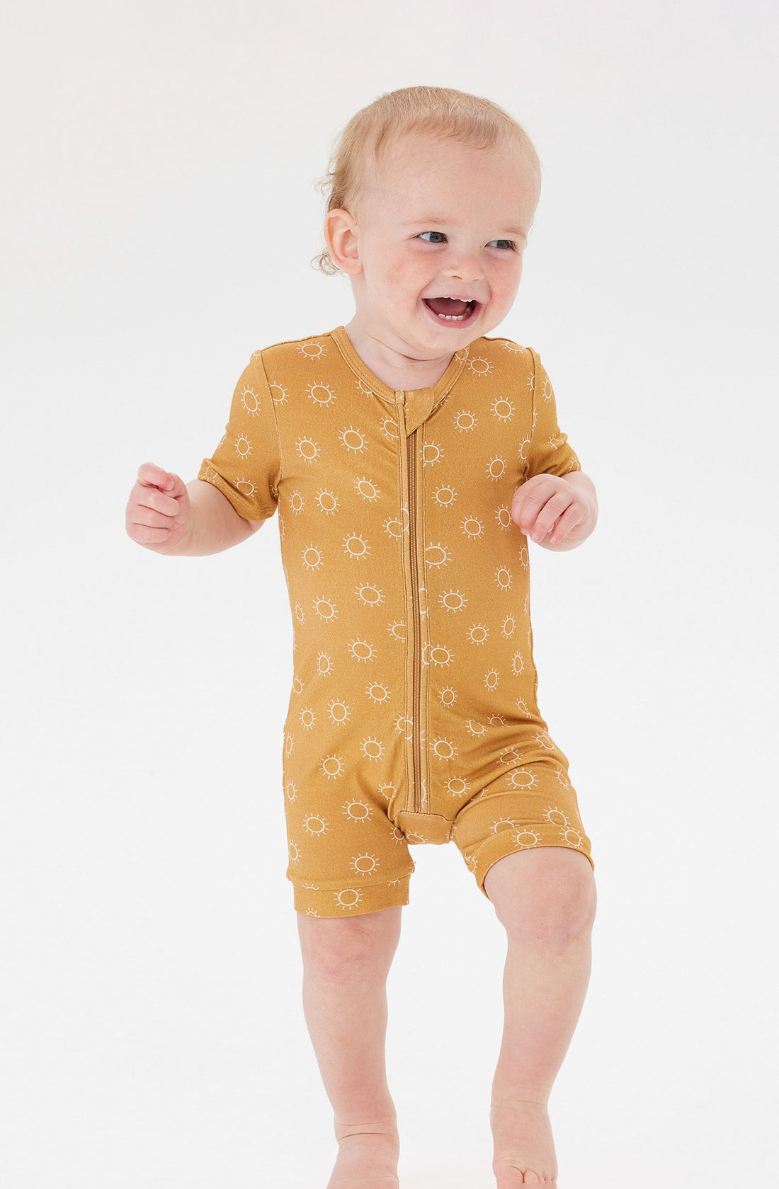 A Toddler wearing the Day or Night Short Sleeve Onesie Sunrise.