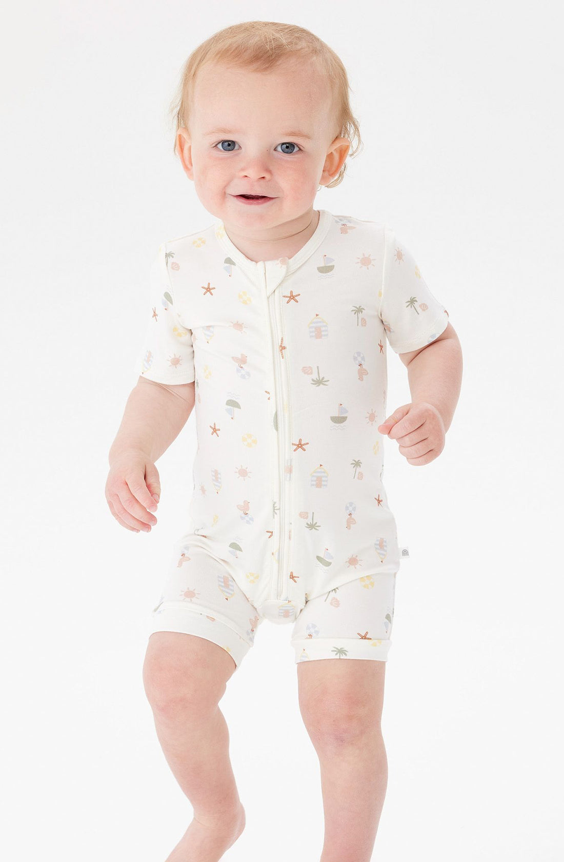 A Toddler wearing the Day or Night Short Sleeve Onesie Vacay.