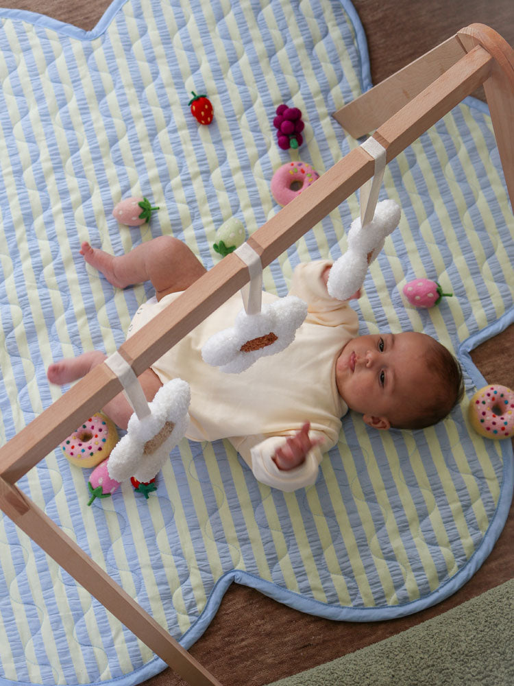 Mosey Me Butter Blue Seersucker Playmat in play space