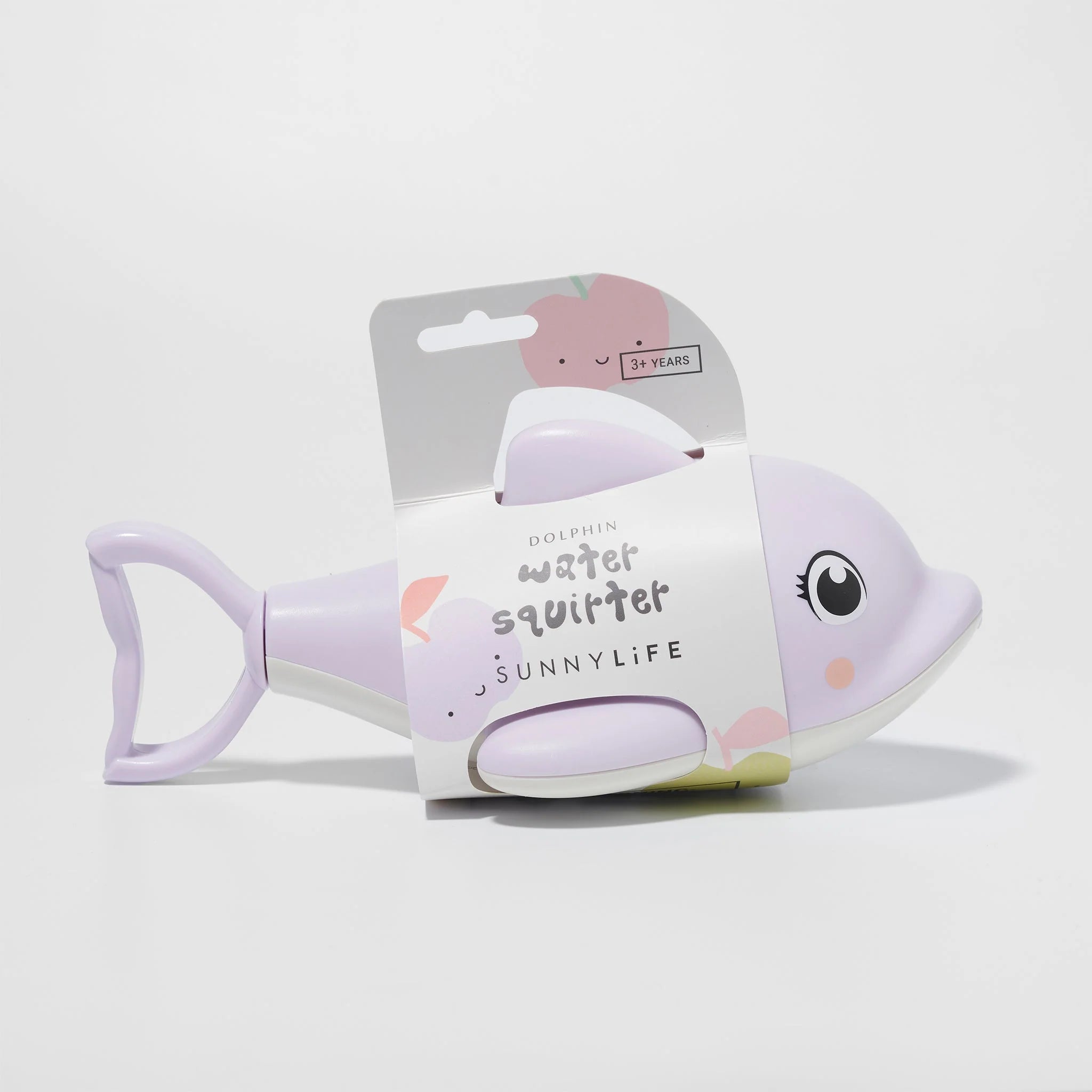 A photo of a light purple, plastic dolphin hand pump squirter toy features a smiling face and an easy-to-use handle. The packaging reads "Dolphin Water Squirter - SUNNYLIFE" and indicates it's suitable for ages 3 and up. The toy is made from ABS PVC.