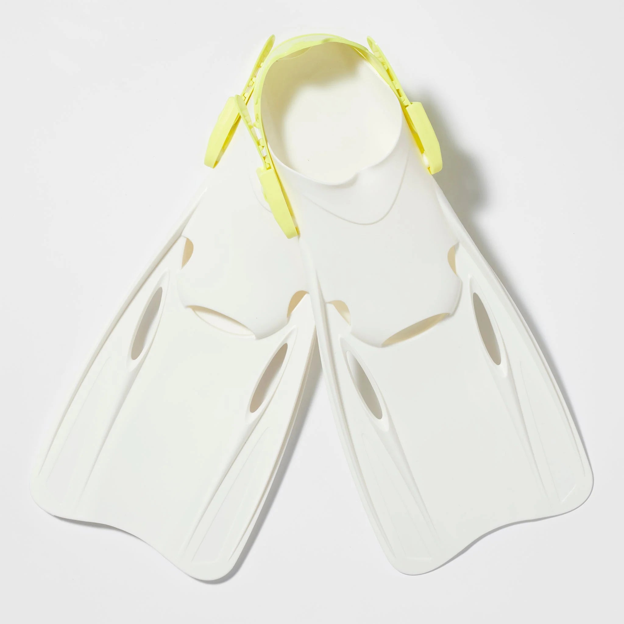 A pair of white scuba diving fins, commonly referred to as flippers, featuring yellow adjustable straps from the SUNNYLIFE Kids Snorkel Set Yellow. Displayed against a white background, the fins are equipped with elongated, streamlined blades optimized for efficient underwater movement.