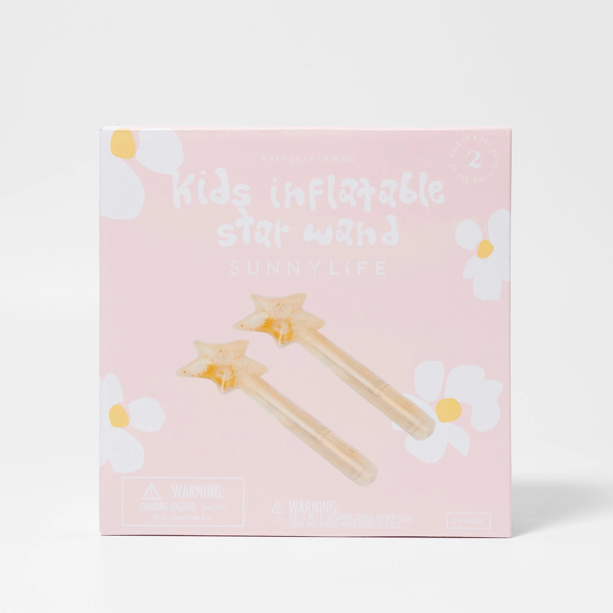 The image shows the packaging for the "Inflatable Star Wands (Set of 2)" from SUNNYLIFE. The box is pink with white flowers and contains two gold-colored star wands made from Phthalate-free PVC. A safety warning is visible on the bottom left corner of the packaging.