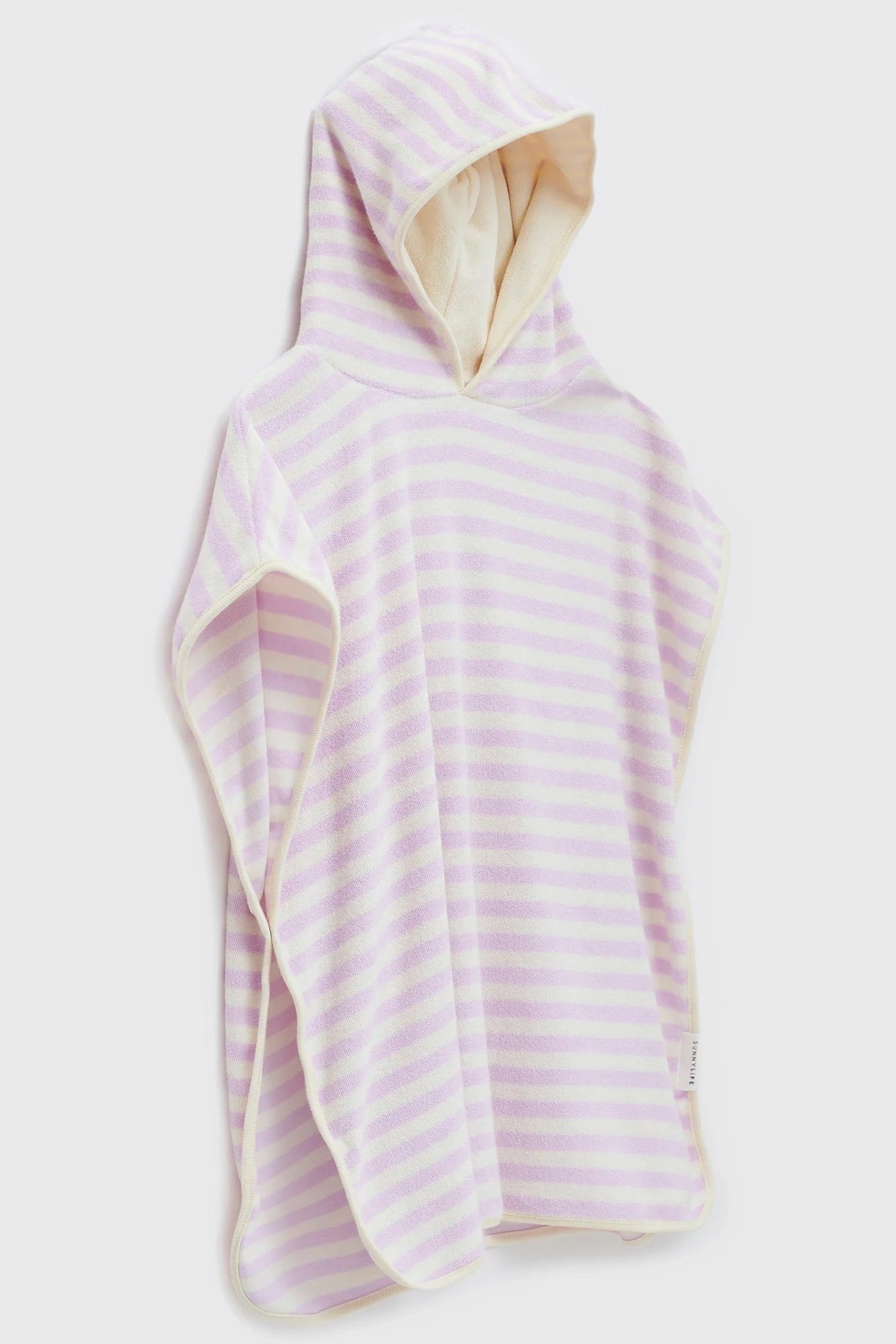 The SUNNYLIFE Kids Character Hooded Towel Princess Swan/Soft Lilac is displayed against a plain background. This hooded poncho towel features soft French terry fabric, light purple and white horizontal stripes, short sleeves, and a cream-colored interior of the hood. The edges are elegantly trimmed with a soft white border—an ideal addition to kids' clothing collections.