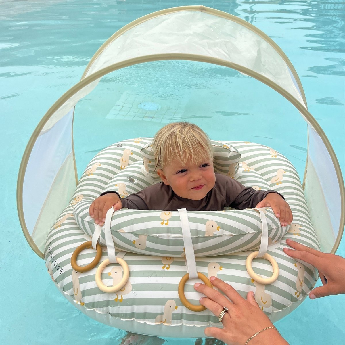 SUNNYLIFE Interactive Baby Float Duck Sage Stripe lifestyle shot