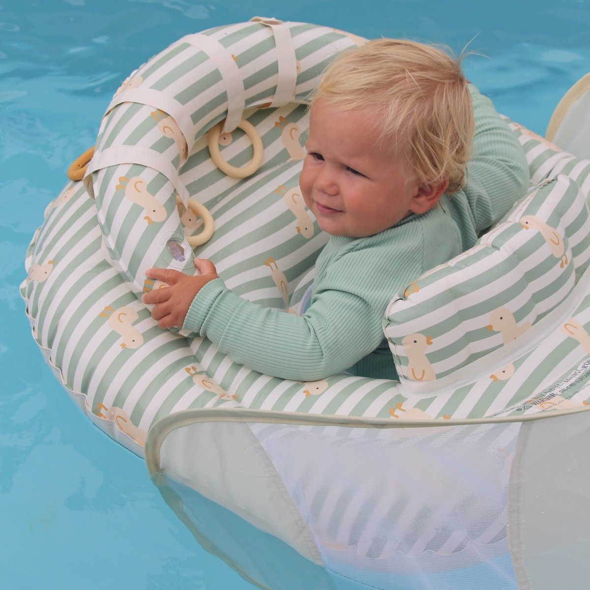 SUNNYLIFE Interactive Baby Float Duck Sage Stripe lifestyle shot