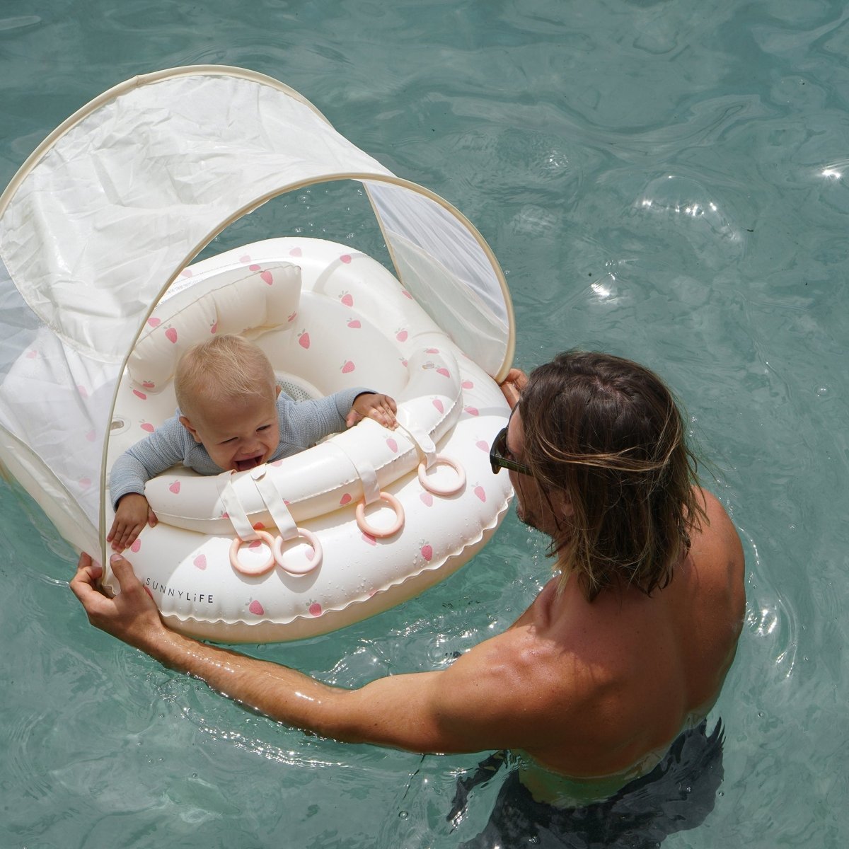 SUNNYLIFE Interactive Baby Float Strawberry Sunshine Pink lifestyle shot