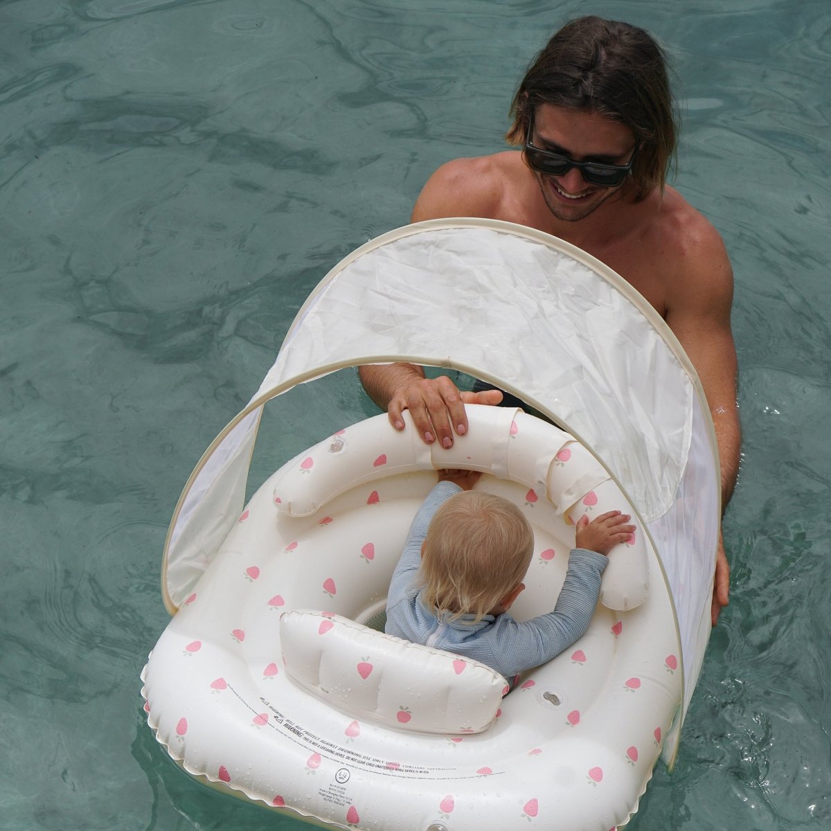 SUNNYLIFE Interactive Baby Float Strawberry Sunshine Pink lifestyle shot