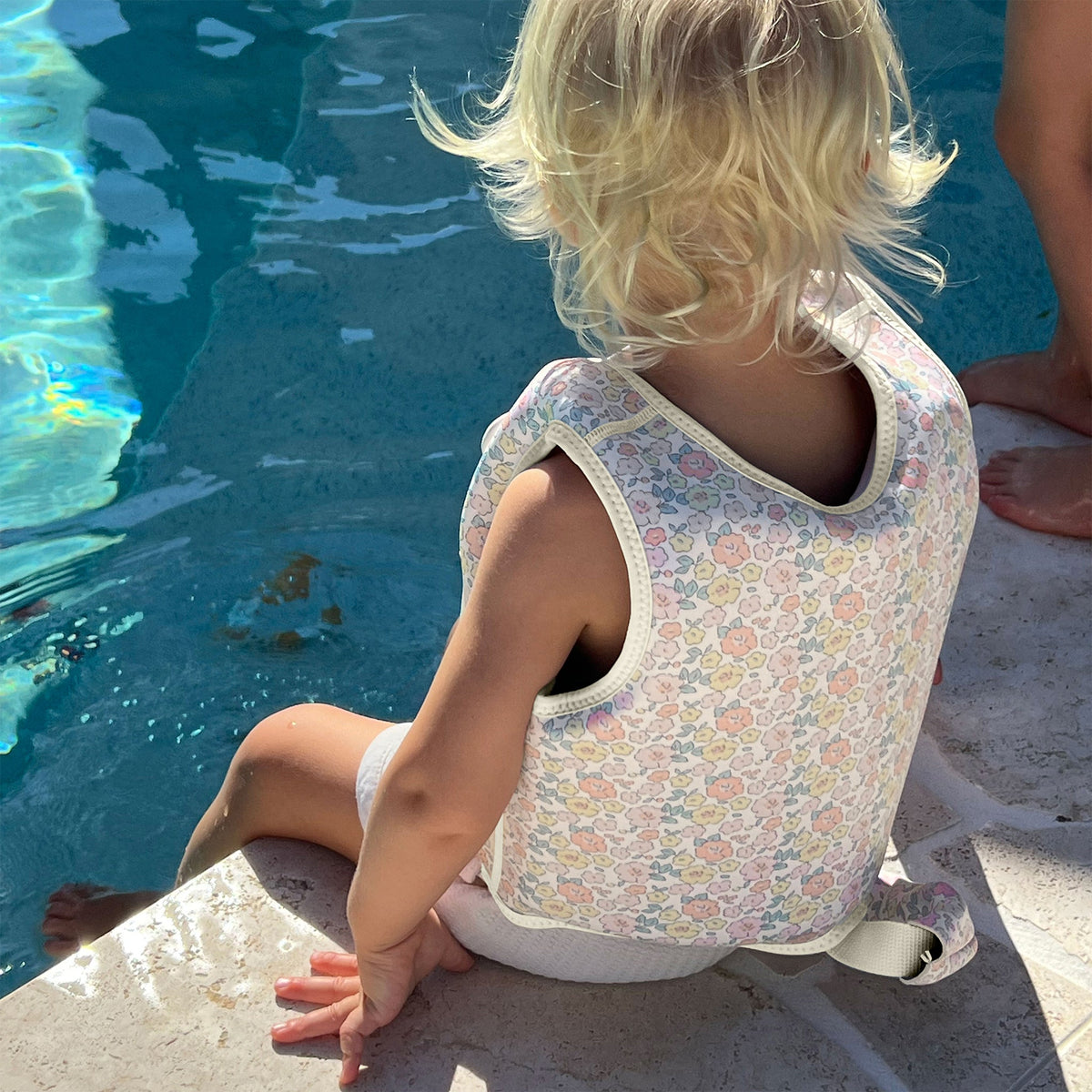 SUNNYLIFE Kids Swim Vest Into the Garden Ditsy Floral lifestyle shot