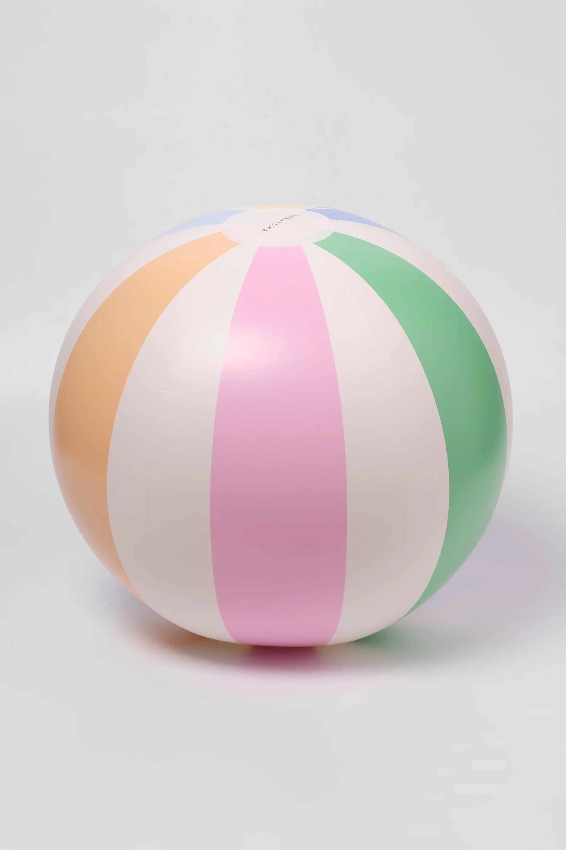 The SUNNYLIFE Inflatable Beach Ball Pastel Gelato, showcasing vertical stripes in soft shades of yellow, pink, green, blue, and white and crafted from durable PVC, rests on a plain white background.