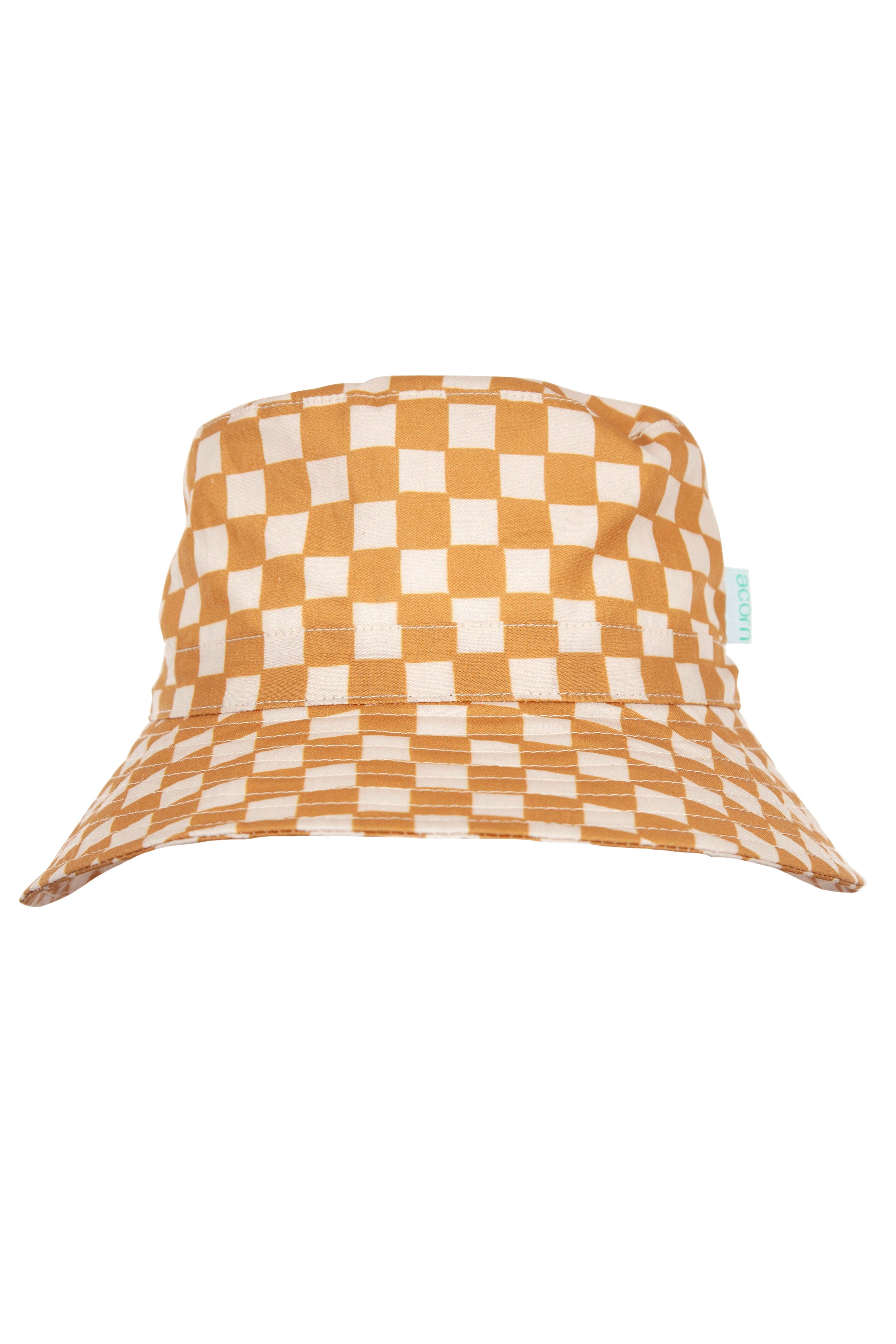 The ACORN KIDS Checkmate Wide Brim Bucket Hat features a stylish caramel and cream check pattern, a flat top, and a wide brim. A small green tag on the side adds a touch of flair, while UPF50+ sun protection keeps you safe on sunny days.