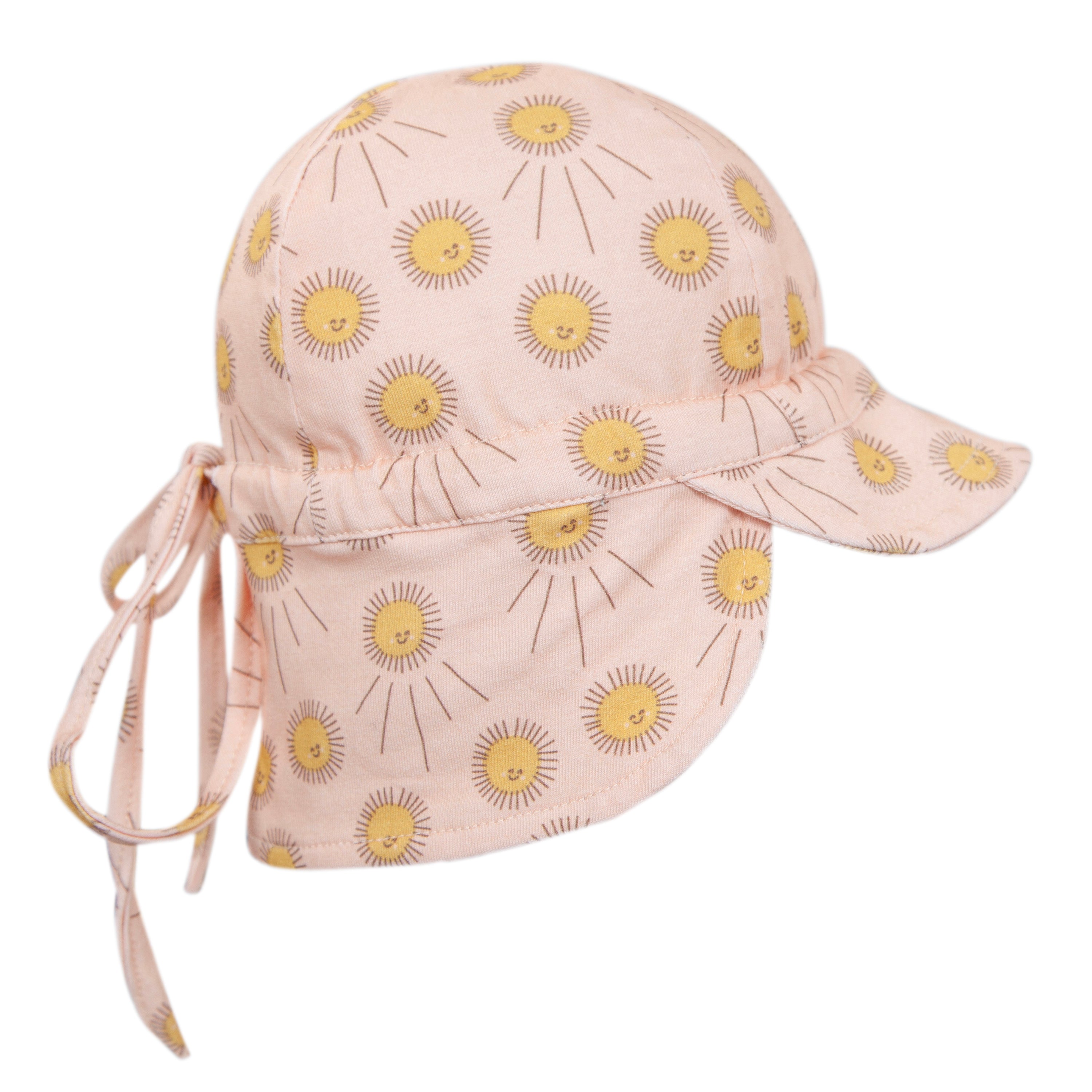 The Acorn Kids - Sunshine Flap Hat by ACORN KIDS is a light pink, soft cotton jersey cap with a neck flap and back tie, decorated with smiling yellow sun faces. Provides UPF50+ protection for little ones.