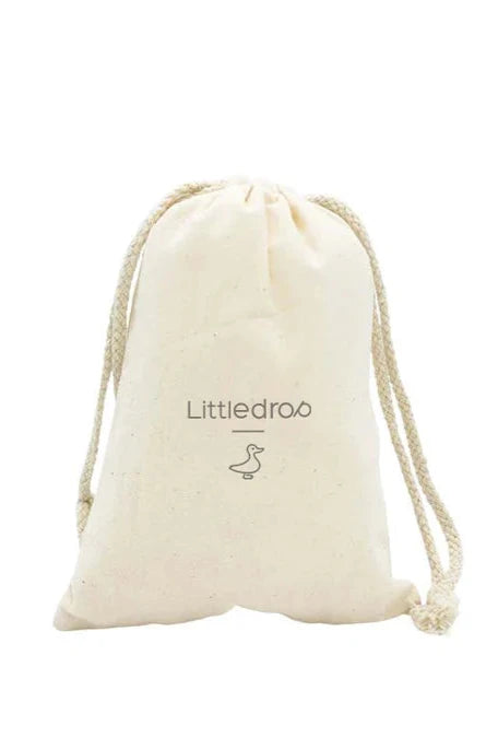 A small, off-white drawstring pouch with "LITTLE DROP" and a simple duck logo printed on the front. Perfect for an explorer's scavenger hunt, it cinches closed with matching rope drawstrings. The background is plain white.