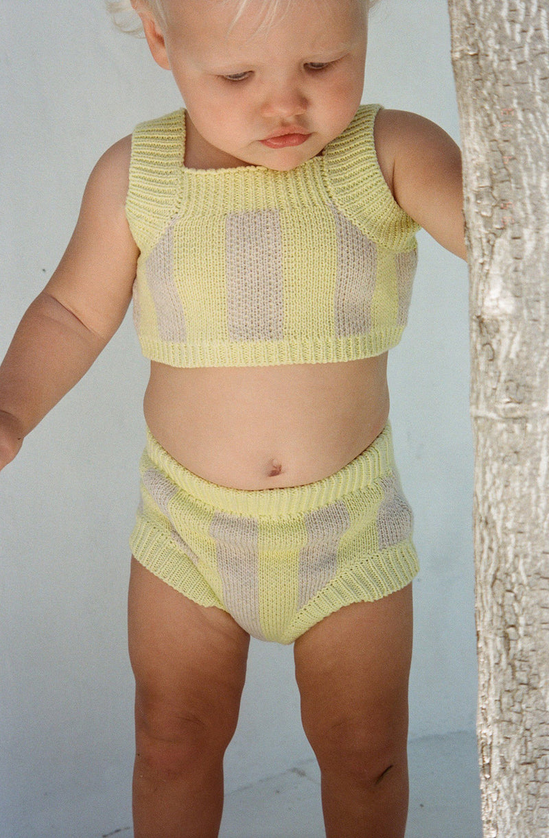 Close up of baby wearing the limon knit set