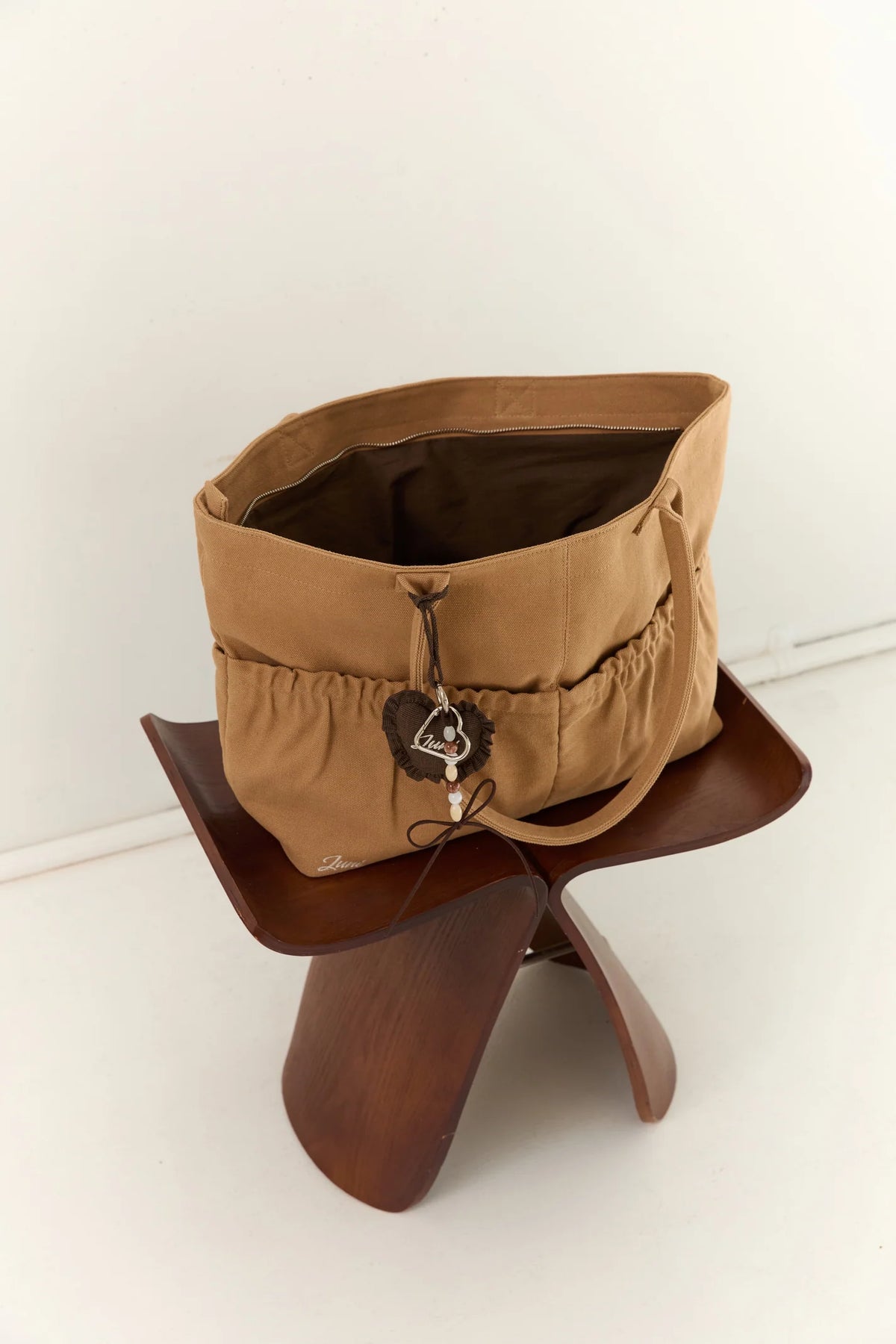 JUNI - The Daily Tote Tan