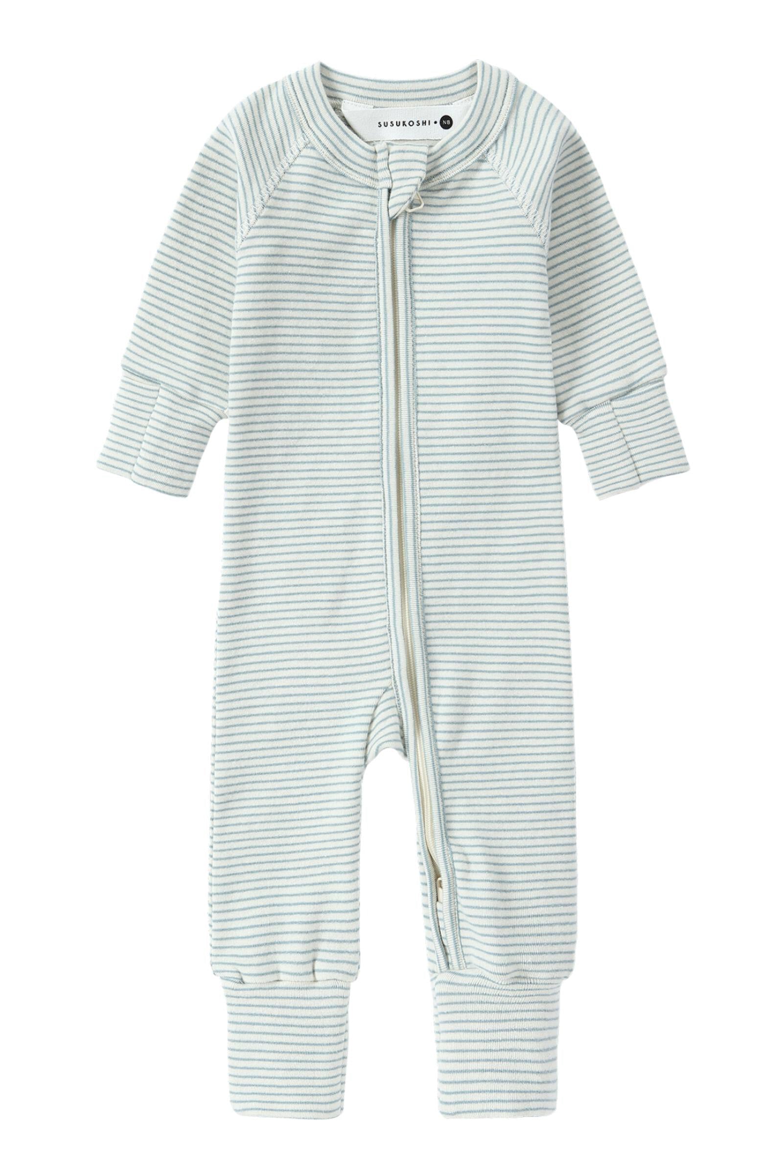 The SUSUKOSHI Zip Suit Seashore is a light gray, long-sleeved baby zip suit with horizontal white stripes. Made from organic cotton, it features a two-way zip running from the neck down to one leg, complete with cuffs at the wrists and ankles.