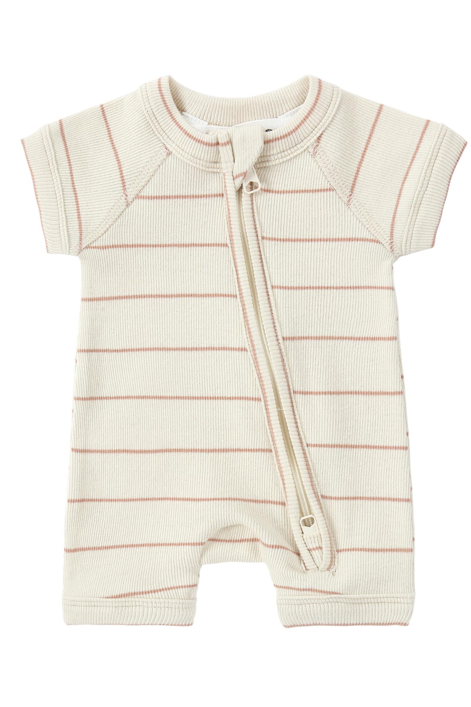 The Zip Suit Coco Stripe by SUSUKOSHI, a cream-colored baby suit adorned with short sleeves and pink horizontal stripes, features a two-way front zipper running diagonally from the neckline to the left leg, complemented by a small button at the end. This garment is crafted from soft, organic cotton knit fabric.