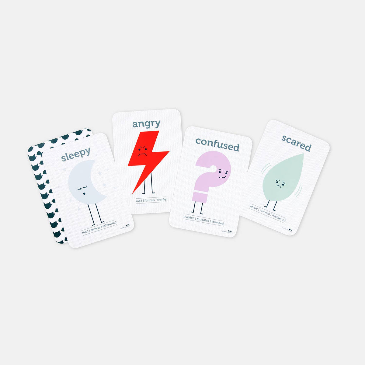 Four illustrated flash cards from the Feeling and Emotion Flash Cards set by TWO LITTLE DUCKLINGS are laid out in a row. The cards feature the emotions: sleepy (represented by a drowsy moon), angry (a red lightning bolt with an angry face), confused (a pink twisted figure), and scared (a green drop of water). Perfect for enhancing communication skills.