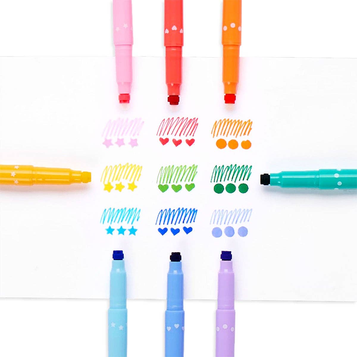 OOLY confetti stamp markers in multiple colours with markings from each in the centre of the markers.