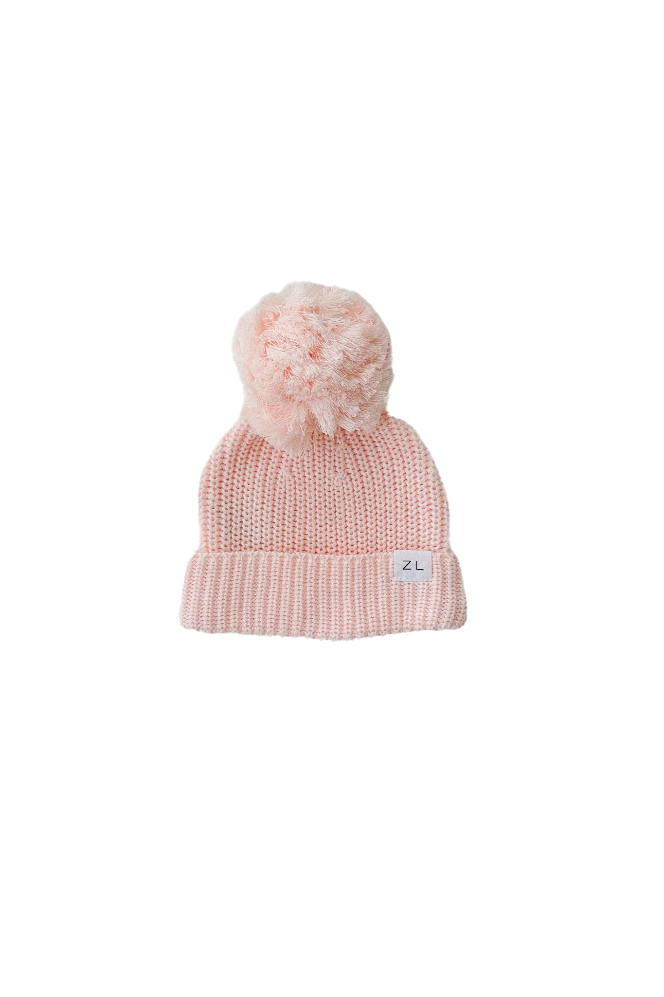 A pink chunky knit beanie hat with a large pom-pom on top. The Beanie Primrose, made from 100% cotton by ZIGGY LOU, features a folded brim with a small white label displaying the letters "ZL.