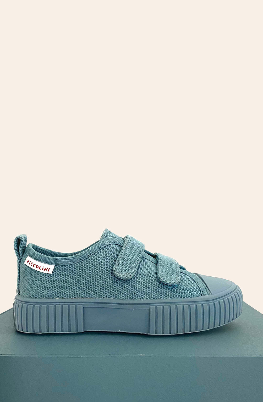 PICCOLINI Original Low Top Sneaker Blue from side.