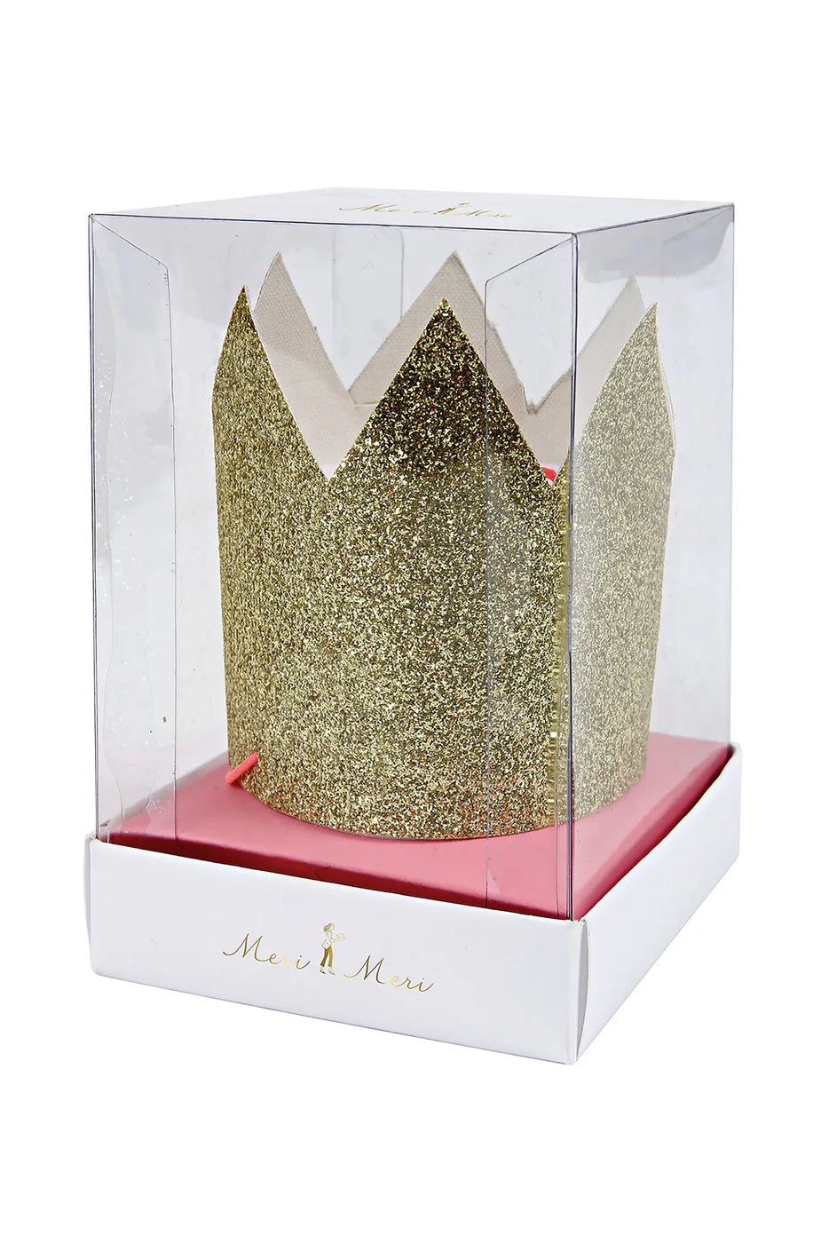 The Mini Gold Glitter Crowns, a sophisticated option among celebration accessories from the MERI MERI brand, are elegantly presented in a clear display box with a pink base. The box is accentuated by a white bottom embellished with gold text.