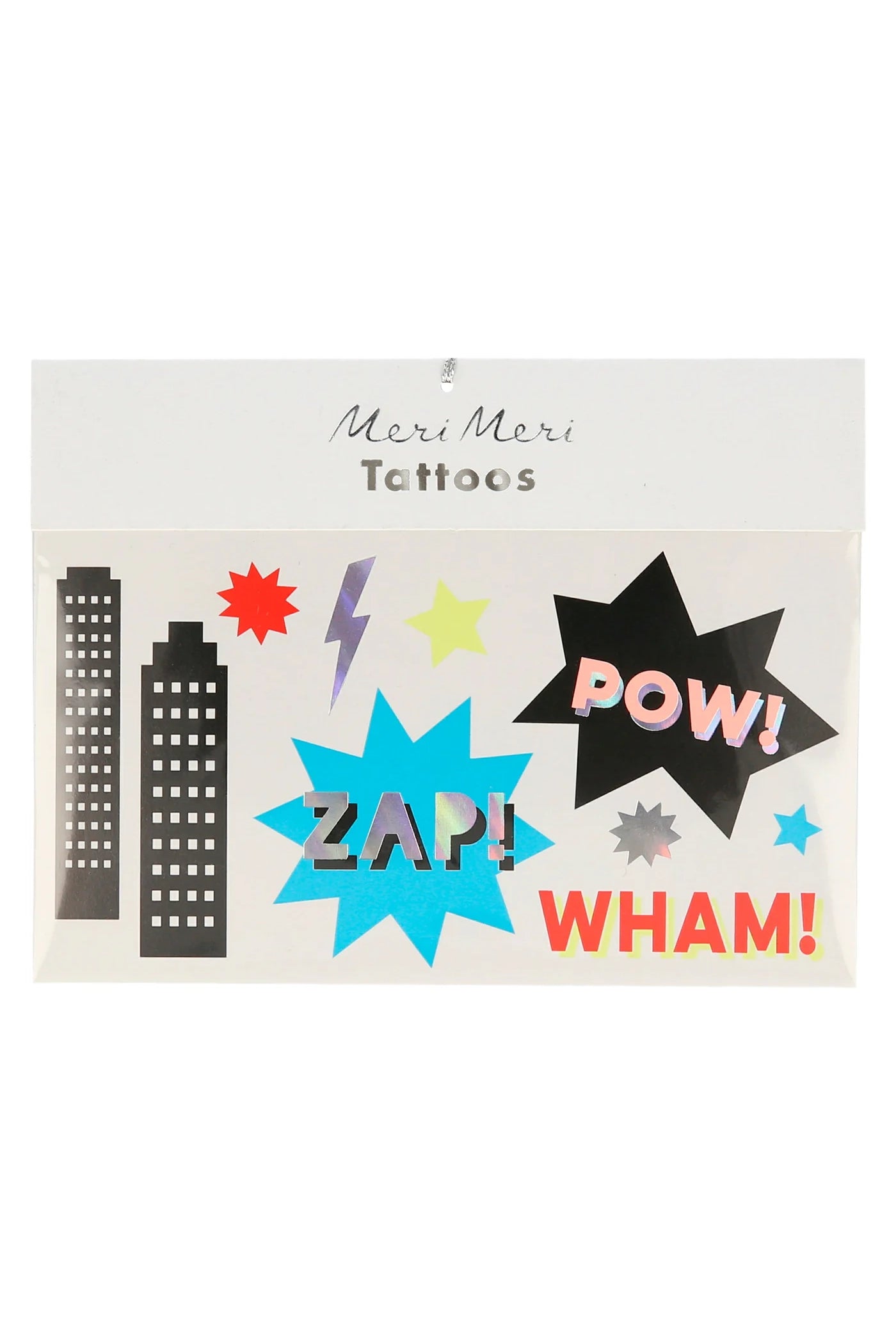 A pack of Superhero Tattoos (Pack of 2) showcases comic-themed words like "POW!", "ZAP!", and "WHAM!" alongside colorful images of skyscrapers, stars, and a lightning bolt highlighted by neon colors. The brand name MERI MERI shines brightly on the packaging.