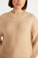 Close up of Ana Oversized Jumper in Dusty Peach.