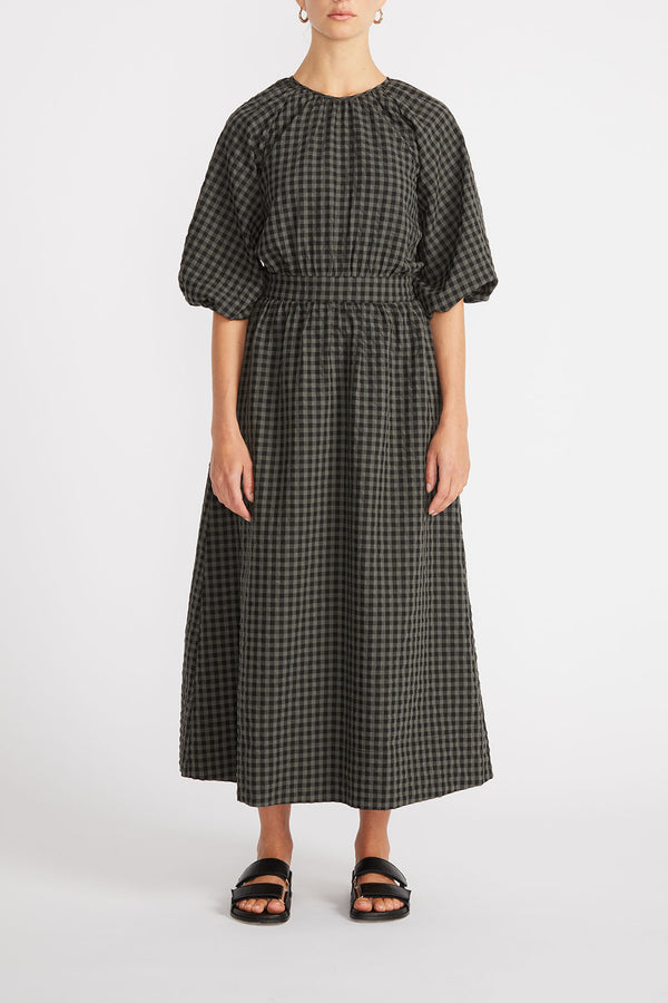 Front view of woman wearing Cleo Midi Dress in khaki/black gingham