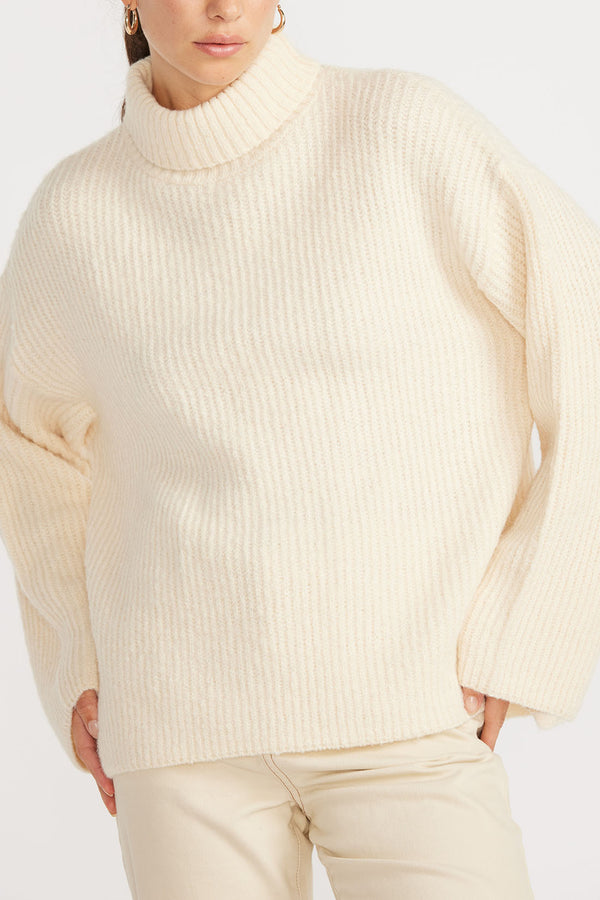 Close up of woman wearing Esme Roll Neck Jumper