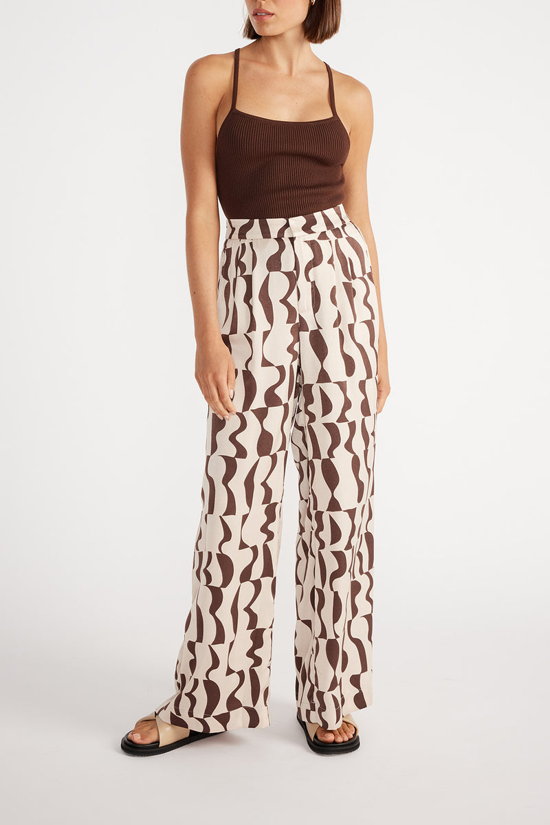 Woman wearing Clea Knit Tank with Muse Wide Leg Pants.